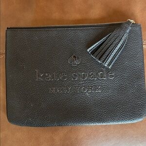 kate spade black pebbled leather tassel pouch